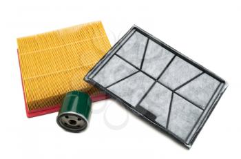 set of three filters for motor vehicles. Isolate on white