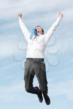 Royalty Free Photo of a Jumping Businessman