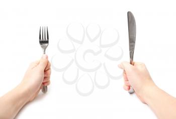 Royalty Free Photo of a Person Holding Utensils