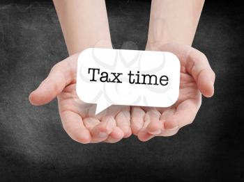 Tax time written on a speechbubble