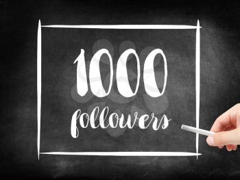 1000 followers written on a blackboard