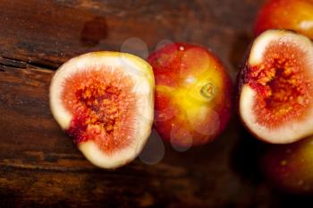 fresh figs macro closeup over old wood boards