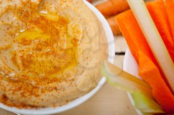 fresh hummus dip with raw carrot and celery arab middle eastent healthy food 