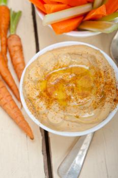 fresh hummus dip with raw carrot and celery arab middle eastent healthy food 