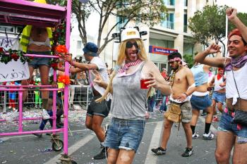 Royalty Free Photo of People in a Parade Wearing Costumes