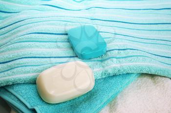 Royalty Free Photo of Soaps on Towels