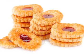 Sweet cookies with jam on gray plate on white background.