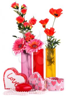 Flowers in vases, red heart candle, necklaces, gift boxes isolated on white background.