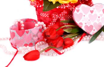 Colorful flowers, candles and gift box close up picture.
