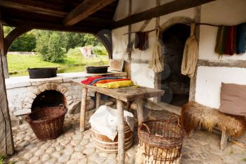 The medieval house with fabric materials and yarn in The Middle Ages Center, the experimental living history museum in Sundby Lolland, Denmark.