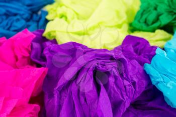 Crumpled colorful crepe papers as a background.