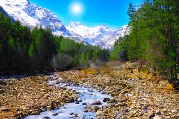 View of the mountains and river into the valley. Elbrus area