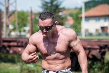 Muscular Man Eating Pancakes