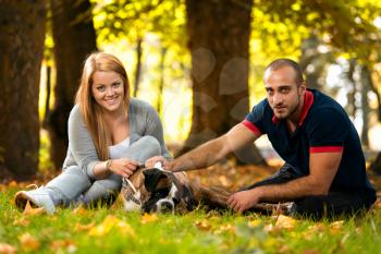 Beautiful Couple With The Dog