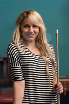 Smiling Happy Girl Playing Billiard
