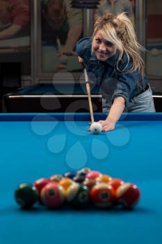 Women Lining Ball Up To Break In Pool