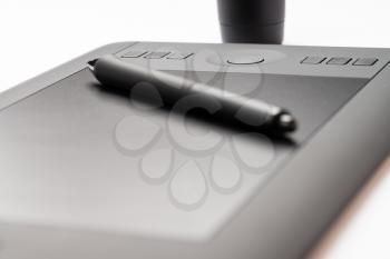 Drawing Tablet With Stylus On White Background
