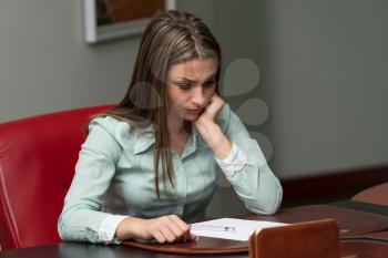 Young And Beautiful Businesswoman Tired From Work In The Office - Business Woman Working Online