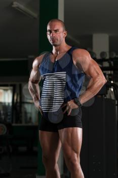 Portrait Of A Physically Fit Man Showing His Well Trained Body - Muscular Athletic Bodybuilder Fitness Model Posing After Exercises