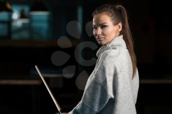 Portrait Of A Young Girl Playing Billiards