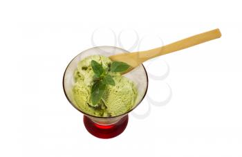 Horizontal photo of green tea ice cream and fresh mint leaf inside of small glass bowl isolated on white  