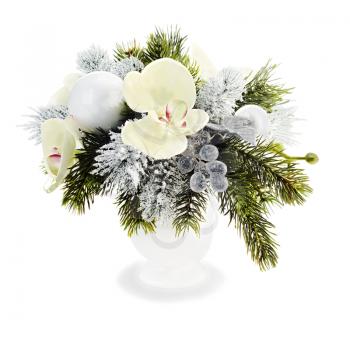 Christmas arrangement of Christmas balls, orchids, snowflakes, beads and pine branches isolated on white background