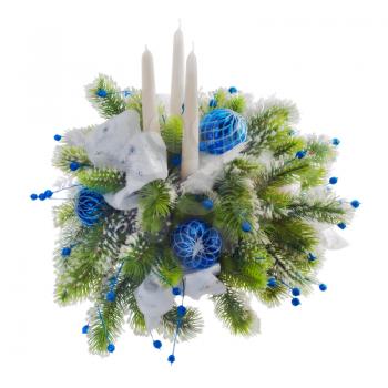 Christmas arrangement of Christmas balls, snowflakes, candles , beads and pine branches isolated on white background