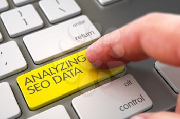 Selective Focus on the Analyzing Seo Data Key. Man Finger Pushing Analyzing Seo Data Yellow Keypad on Modern Laptop Keyboard. Analyzing Seo Data Concept. 3D Illustration.