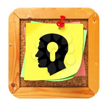 Psychological Concept - Profile of Head with a Keyhole Icon on Yellow Sticker on Cork Message Board.
