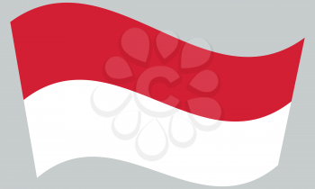 Flag of Indonesia waving on gray background