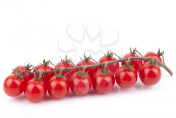 Red cherry tomatoes isolated on a white background.