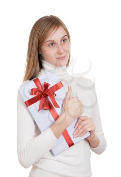 Portrait of a beautiful girl with a gift in their hands. isolated on white