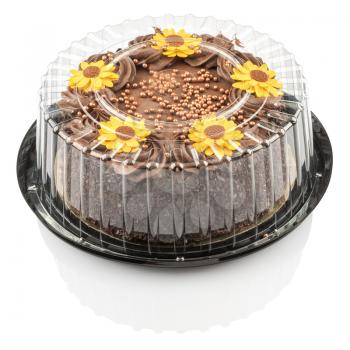 cake with chocolate cream and decorated with yellow flowers isolated on a white background with clipping path