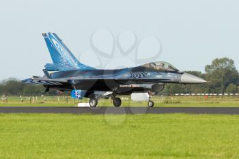 LEEUWARDEN,FRIESLAND,HOLLAND-SEPTEMBER 17: Belgium F-16 Demo Team at the Luchtmachtdagen Airshow on September 17, 2011 at Leeuwarden Airfield,Friesland,Holland