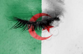 Crying woman, pain and grief concept, flag of Algeria
