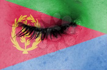 Crying woman, pain and grief concept, flag of Eritrea