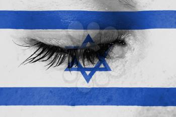 Crying woman, pain and grief concept, flag of Israel