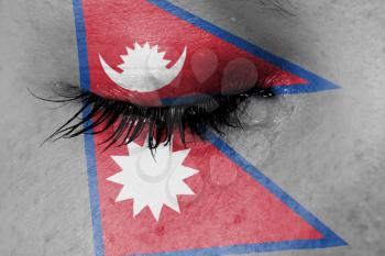 Crying woman, pain and grief concept, flag of Nepal