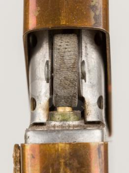 Very old lighter on a white background