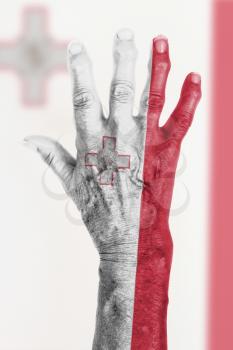 Isolated old hand with flag, European Union, Malta
