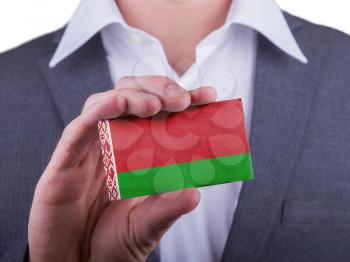 Businessman showing card, matte paper effect, Belarus