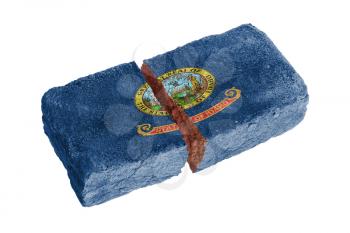 Rough broken brick, isolated on white background, flag of Idaho
