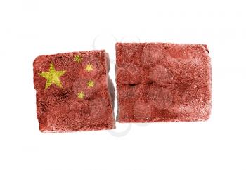 Rough broken brick, isolated on white background, flag of China