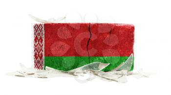 Brick with broken glass, violence concept, flag of Belarus