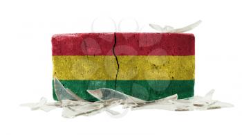 Brick with broken glass, violence concept, flag of Bolivia