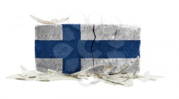 Brick with broken glass, violence concept, flag of Finland