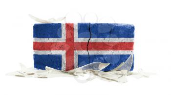 Brick with broken glass, violence concept, flag of Iceland