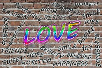 Love word cloud painted with grafitti on a brick wall