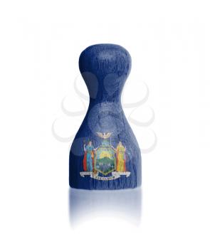 Wooden pawn with a painting of a flag, New York