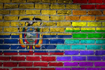 Dark brick wall texture - coutry flag and rainbow flag painted on wall - Ecuador
